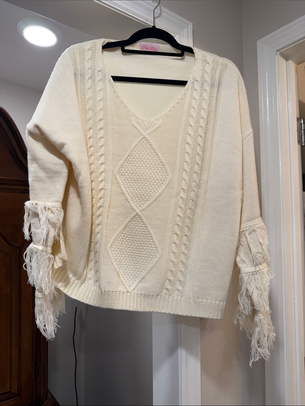 Pink Lily Cream Cable Knit V-Neck Sweater with Fringe Sleeves